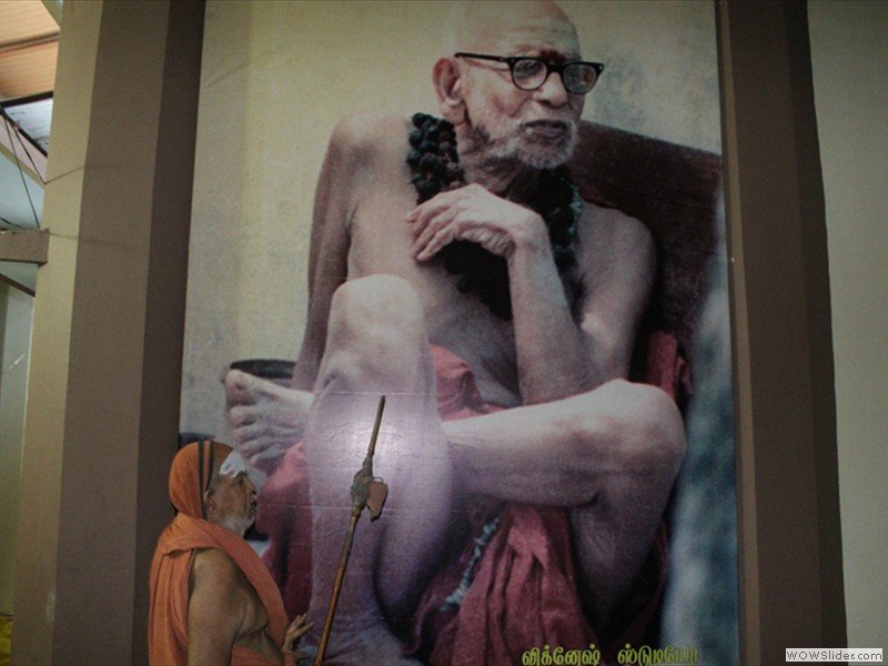 His Holiness walking past Mahaswamiji's photograph