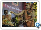 His Holiness being adorned with Silver Crown