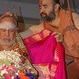 His Holiness being adorned with a shawl