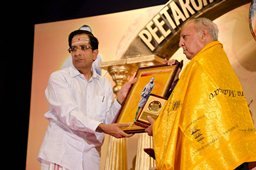 Justice Pukhan being honoured