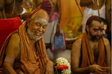 Their Holinesses blessing devotees