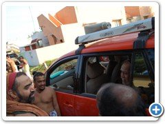 14. Their Holinesses enquiring a Bhattacharya about the village and temple